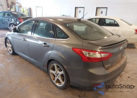 2014 Ford Focus Titanium from USA, damaged, VIN 1FADP3J27EL289596